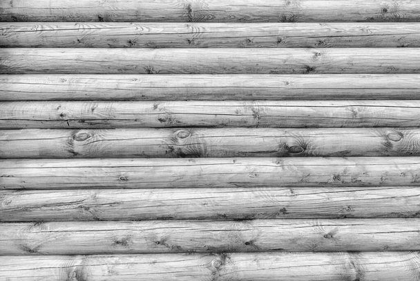 "Деревянная стена из бревна в качестве фона
." - Фото, изображение