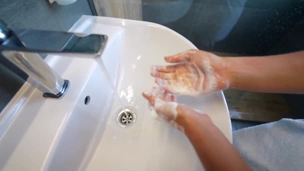 close up woman washing hands with soap and water, white foam, in the bathroom, under tap in the sink, personal hygiene and care, coronavirus prevention - Πλάνα, βίντεο