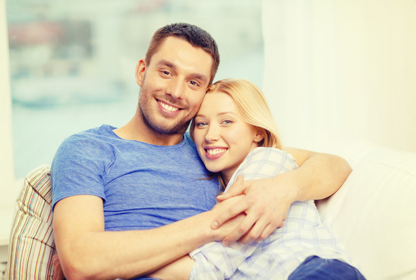 smiling happy couple at home - 写真・画像