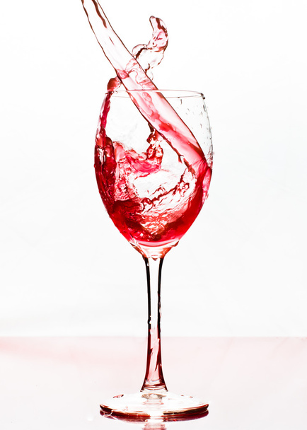 Wine pourred in a glass - Valokuva, kuva