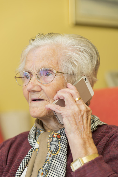 grandmother calling by phone  - Photo, image