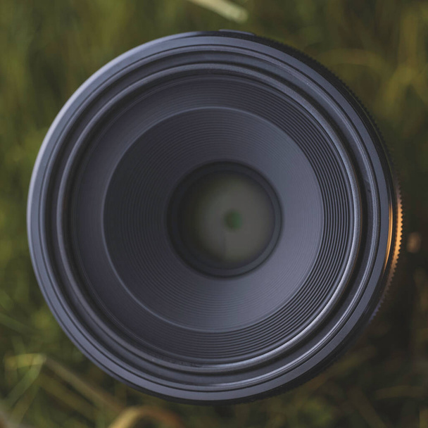 "Macro camera lens in grass" - 写真・画像