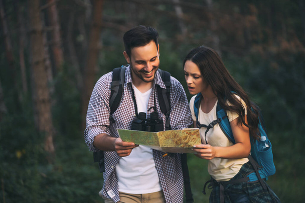 young couple hiking together - Photo, Image