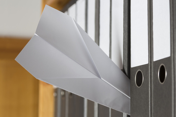 Paper Plane stuck between folders - Photo, Image