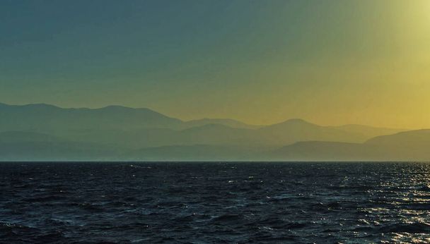 Landschap van de zee bij zonsondergang  - Foto, afbeelding