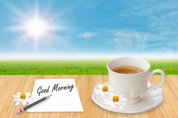 Kaffeetasse und "Guten Morgen" auf Zettel - Foto, Bild