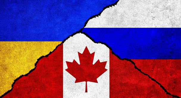 Rusland, Oekraïne en Canada vlag samen op de muur. Diplomatieke betrekkingen tussen Rusland, Canada en Oekraïne - Foto, afbeelding