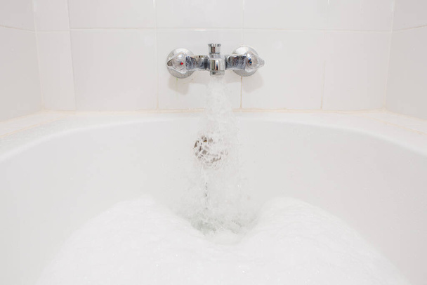 "Luxury bath tub and faucet with water." - Photo, Image
