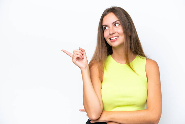 Young caucasian woman isolated on white background intending to realizes the solution while lifting a finger up - Φωτογραφία, εικόνα