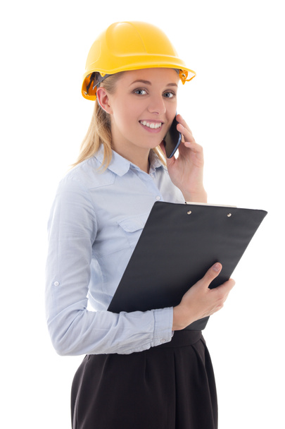 счастливый деловой женщина - архитектор в шлеме строителя, говорящем phon - Фото, изображение