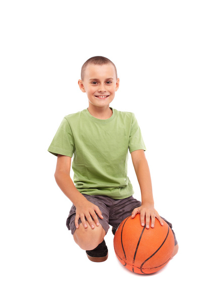 Child with basketball isolated on white background - Valokuva, kuva