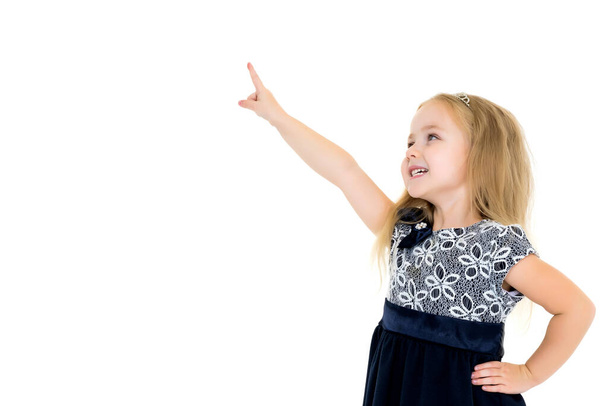Little girl is showing a finger - Foto, Imagem