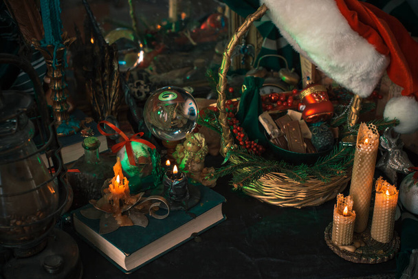 Concept of Christmas atmosphere, divination, fate predictions, magical ball and other magic. Illustration of magical aesthetic - Photo, Image