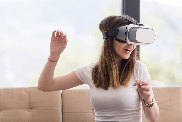 "woman using VR-headset glasses of virtual reality" - Φωτογραφία, εικόνα