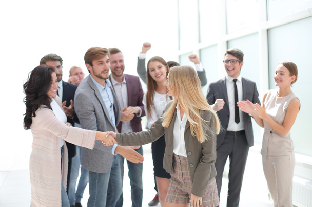 team of young people congratulating their colleagues - Фото, изображение