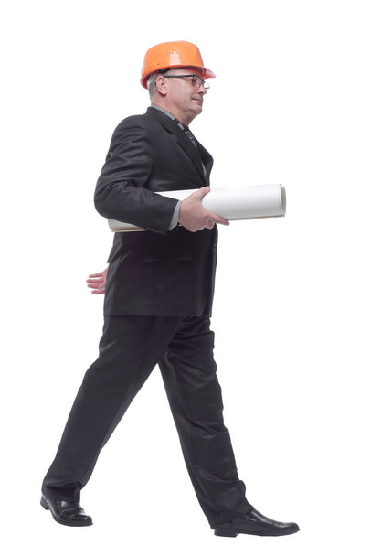 Businessman in wearing hard hat holding documents - Foto, Imagem