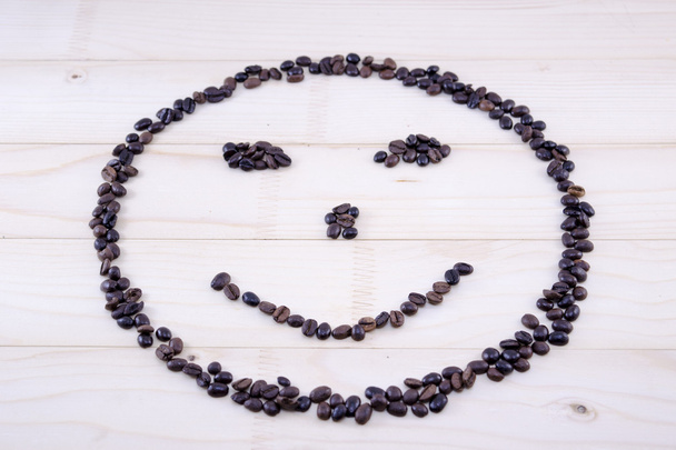 Smiley gemaakt volledig uit koffie korrels - Foto, afbeelding