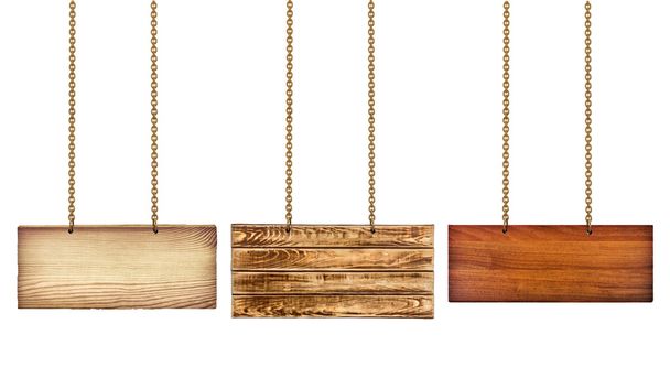 collection of various wooden signs with a gold chain on white ba - Photo, Image