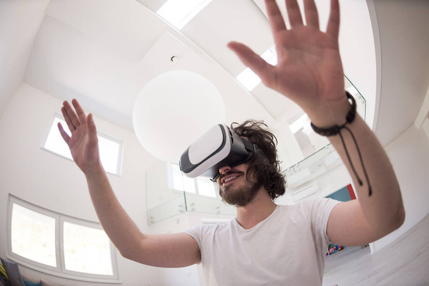 "man using VR-headset glasses of virtual reality" - Fotografie, Obrázek
