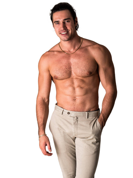 "Three quarters shot of handsome shirtless athletic young man" - Photo, image