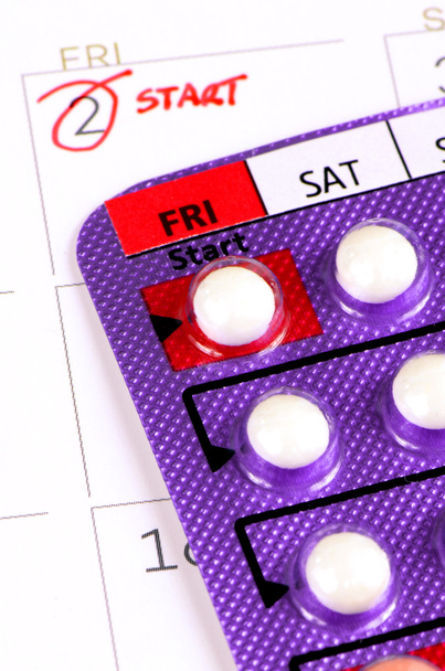 Strip of Contraceptive Pill on the Calendar with Start Taking Date Remark - Photo, Image