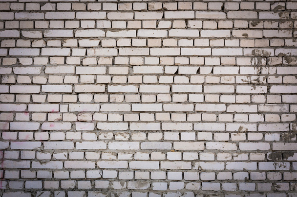 Grunge metselen van de achtergrond van een witte steen met vignet - Foto, afbeelding
