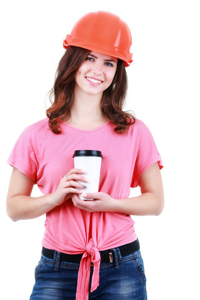 "Mladá žena stavitel s helmou a kávou" - Fotografie, Obrázek