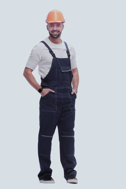 "confident man in overalls . isolated on white" - 写真・画像