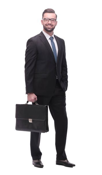 confident serious businessman with a leather briefcase. isolated on white - Photo, image