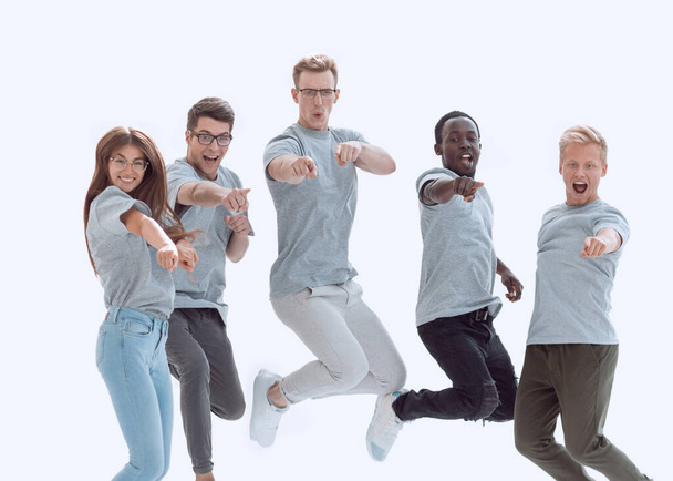 "випадкова група щасливих молодих людей стрибає
" - Фото, зображення