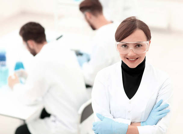portrait of scientist in laboratory background. - Fotó, kép