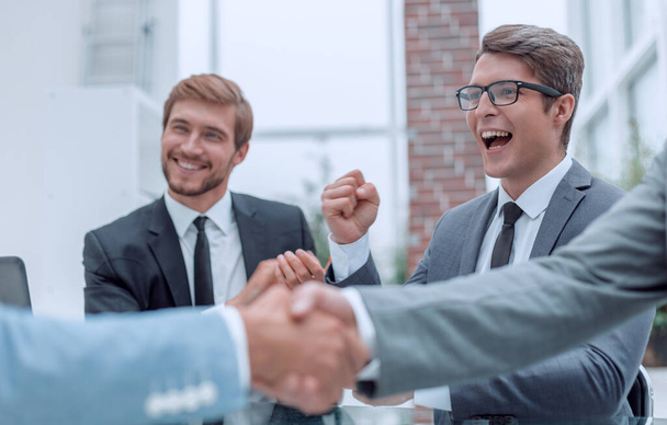handshake of business people on a blurred office background. - Photo, Image