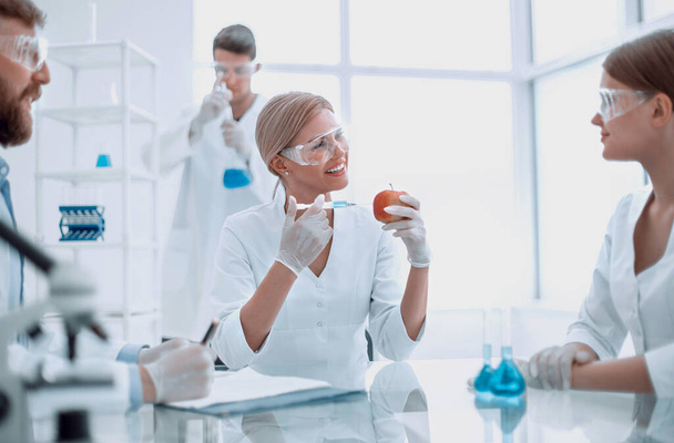"Food quality control. a group of scientists testing the fruit" - Photo, Image