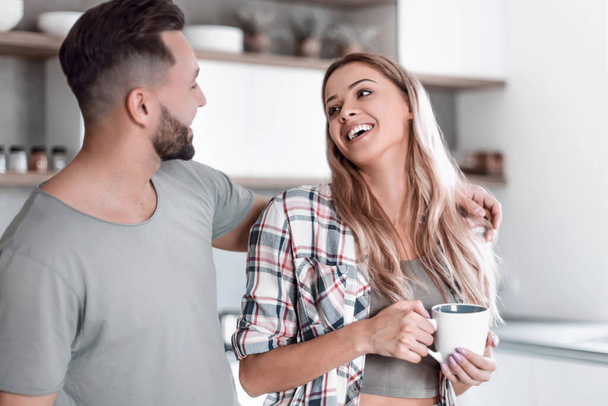 happy young couple in kitchen in good morning time - Photo, Image