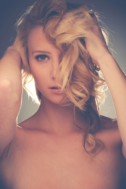 Beauty portrait of a pretty caucasian woman with blond hair over - Foto, afbeelding