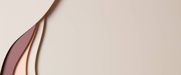 Abstraktes beigefarbenes Papier Textur Hintergrund. Minimale Komposition im Papierschnitt mit Schichten geometrischer Formen und Linien in braunen Farbtönen. Ansicht von oben. - Foto, Bild
