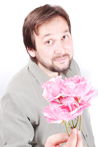 Cute man with roses - Φωτογραφία, εικόνα