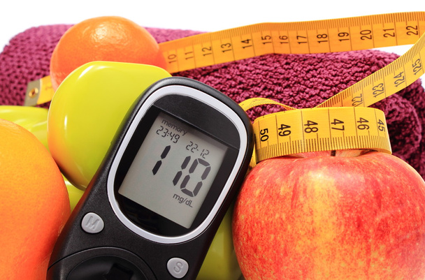 Glucosímetro, frutas frescas, cinta métrica, accesorios para fitness
 - Foto, imagen