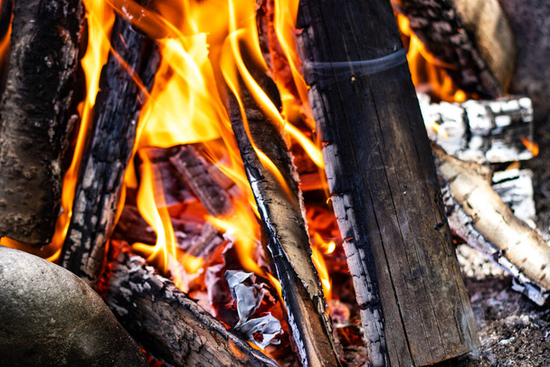 fire flames on a wooden background - Fotografie, Obrázek