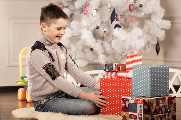 Boy with New Year presents - Foto, Imagen