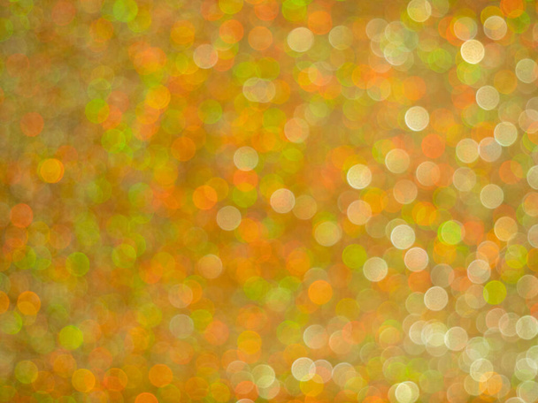 Золотой блеск Рождества абстрактный фон. Блестящий золотой боке. Красивый золотой фон. - Фото, изображение
