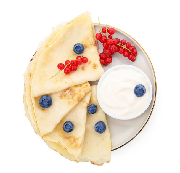 Delicious crepes with natural yogurt, blueberries and red currants on white background - Φωτογραφία, εικόνα