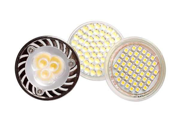 Три енергозберігаючі світлодіодні лампи ізольовані на білому
 - Фото, зображення