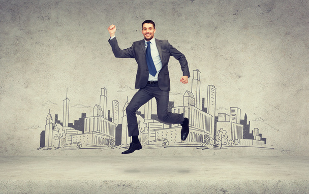 smiling businessman jumping - Foto, Imagem