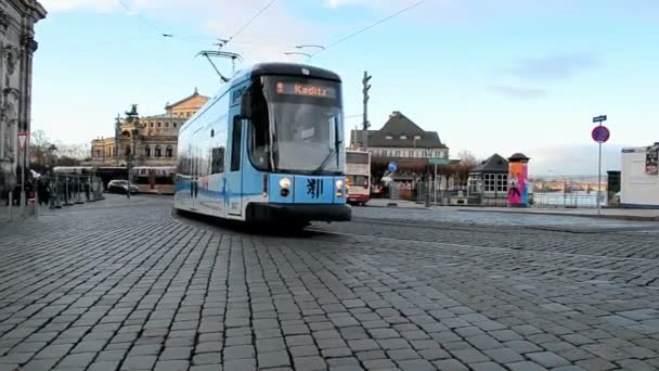 Electric blue tram on the street in Dresden city, Germany. - Video