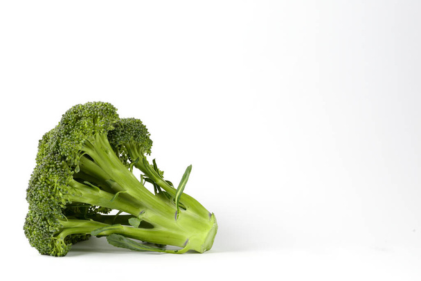 Isolated broccoli on white background - Fotoğraf, Görsel