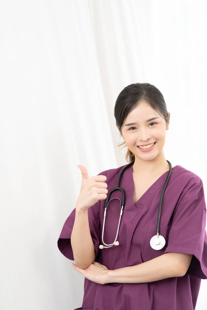 Smiling asian female doctor with stethoscope. Portrait of a beautiful doctor. health care and prevention concept. copy space, medical concept. - Photo, image