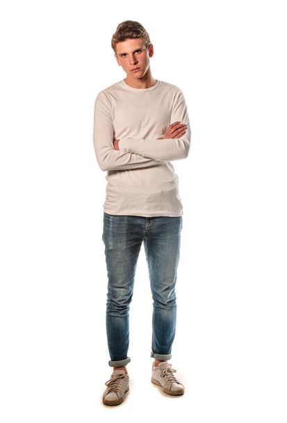 Studio body shot of a trendy young man wearing modern style clothes - Foto, afbeelding
