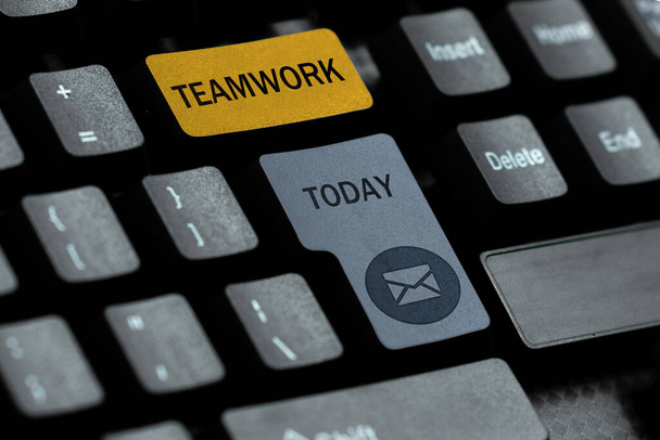 Text sign showing Teamwork, Word Written on the group s is collaborative effort to accomplish a common goal Typing Firewall Program Codes, Typewriting Rules And Regulations Book - Photo, Image