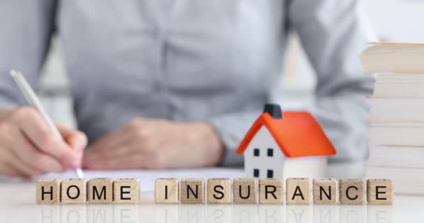 Agent arranges insurance for house. Protection and security of housing concept - Footage, Video
